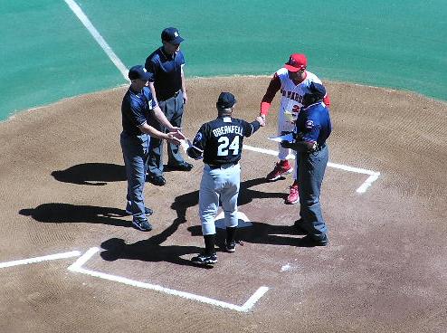 The Managers exchanging Line Up cards